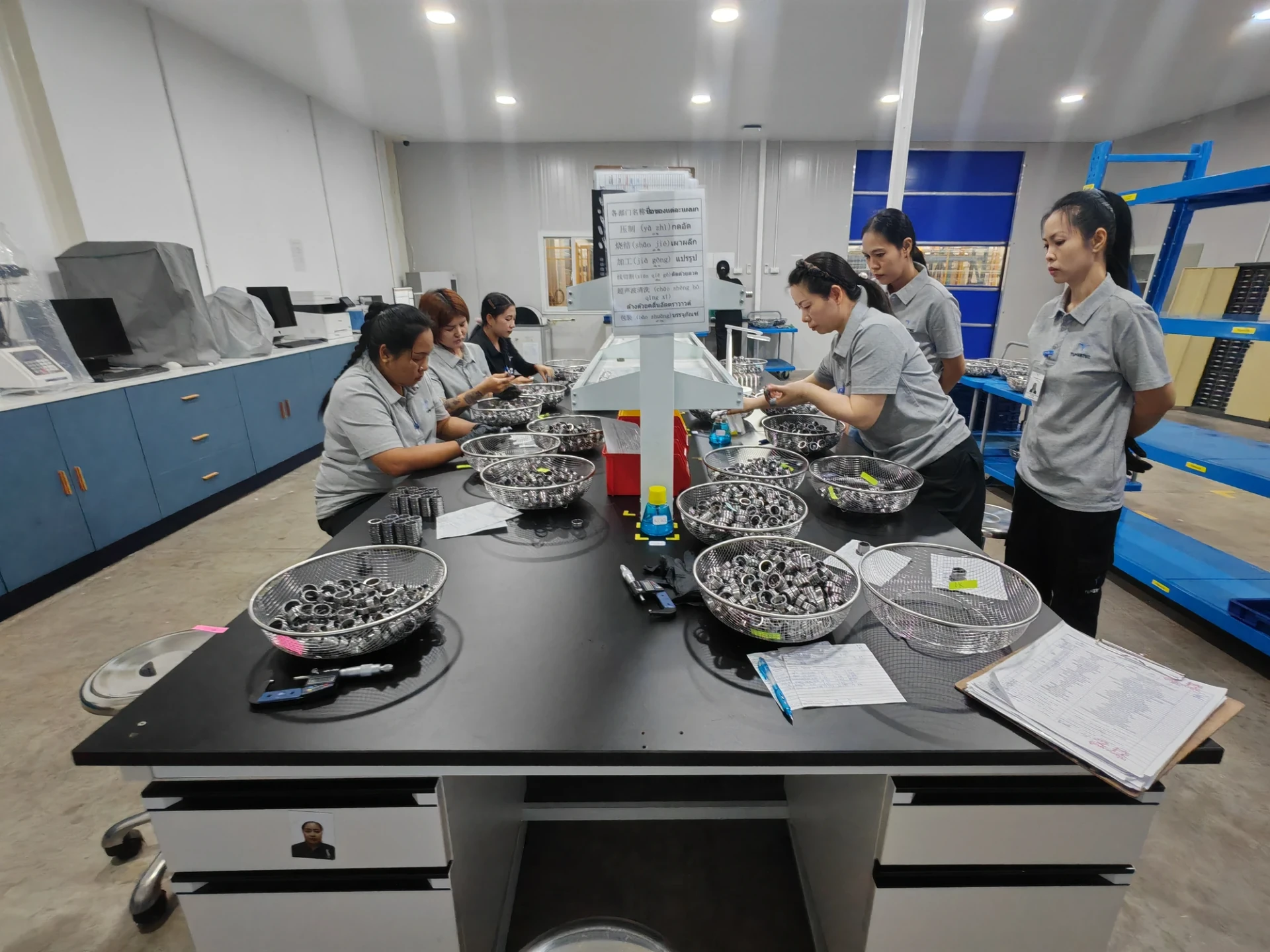 TUNGSTEC team inspecting carbide components in Thailand